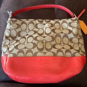New coach purse tan logo orange strap/bottom